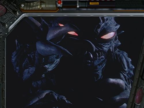 妖兽摩志 数字时代的奇幻隐喻与身份探寻